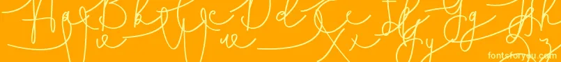 Hasnita Font – Yellow Fonts on Orange Background