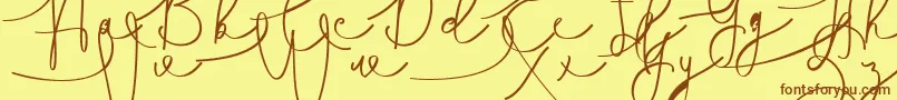 Hasnita Font – Brown Fonts on Yellow Background