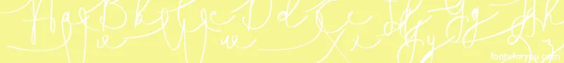 Czcionka Hasnita – białe czcionki na żółtym tle