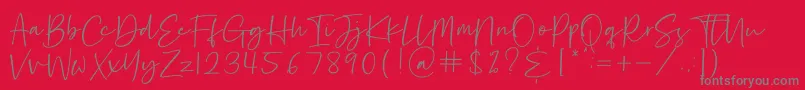 フォントHastage – 赤い背景に灰色の文字