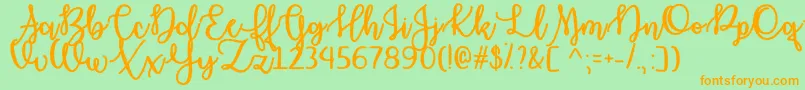 Haunted Moon   Font – Orange Fonts on Green Background