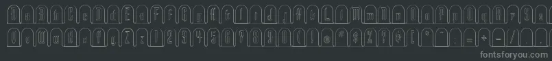 HE      -fontti – harmaat kirjasimet mustalla taustalla