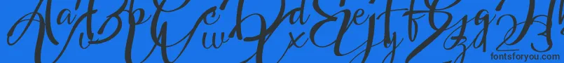 Fonte Headland Script – fontes pretas em um fundo azul