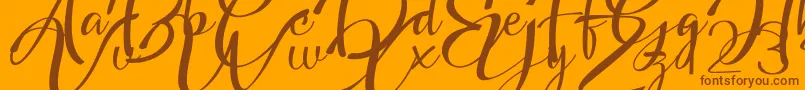 Headland Script Font – Brown Fonts on Orange Background