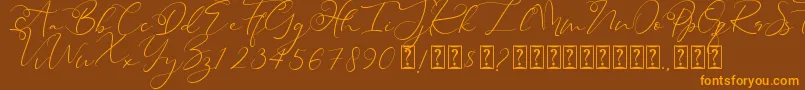フォントHeanffe – オレンジ色の文字が茶色の背景にあります。