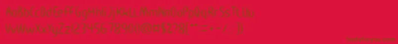 フォントHEART SHAPED – 赤い背景に茶色の文字