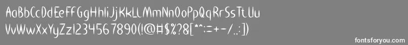 フォントHEART SHAPED – 灰色の背景に白い文字