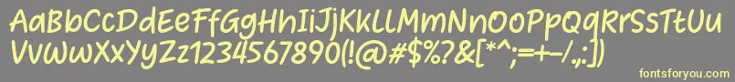 Heart Warming Font by Situjuh 7NTypes Font – Yellow Fonts on Gray Background