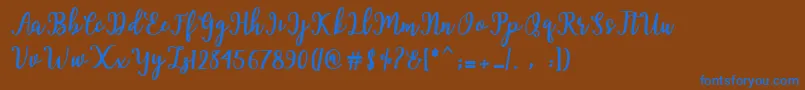 フォントHearted Script – 茶色の背景に青い文字