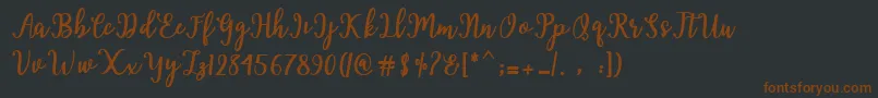 Hearted Script Font – Brown Fonts on Black Background
