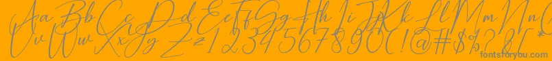 Hearth Stone-Schriftart – Graue Schriften auf orangefarbenem Hintergrund