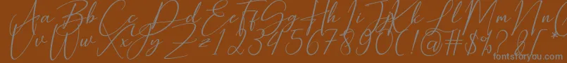 Hearth Stone-Schriftart – Graue Schriften auf braunem Hintergrund