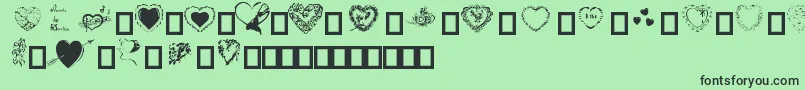 Hearts by Darrian Font – Black Fonts on Green Background