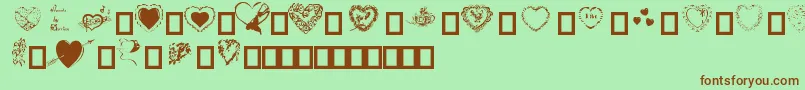 Hearts by Darrian Font – Brown Fonts on Green Background