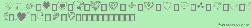 Hearts by Darrian Font – Gray Fonts on Green Background