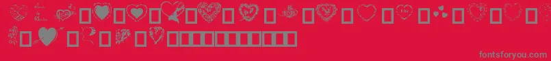 Fonte Hearts by Darrian – fontes cinzas em um fundo vermelho