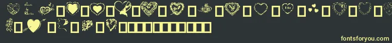 Hearts by Darrian Font – Yellow Fonts on Black Background