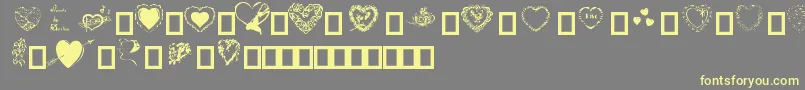 Hearts by Darrian Font – Yellow Fonts on Gray Background