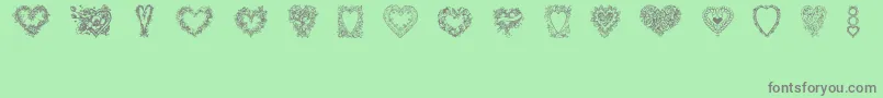 Hearts of Lime-Schriftart – Graue Schriften auf grünem Hintergrund
