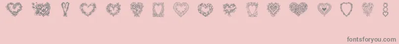 Fonte Hearts of Lime – fontes cinzas em um fundo rosa