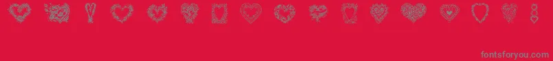 Fonte Hearts of Lime – fontes cinzas em um fundo vermelho