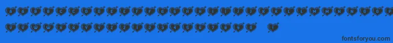 Czcionka HeartsandArrows – czarne czcionki na niebieskim tle