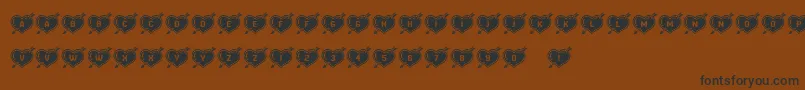 HeartsandArrows Font – Black Fonts on Brown Background