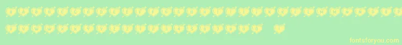 HeartsandArrows Font – Yellow Fonts on Green Background