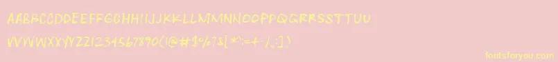 Heartwrecked Font – Yellow Fonts on Pink Background