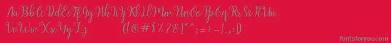Hearty Script Font – Gray Fonts on Red Background