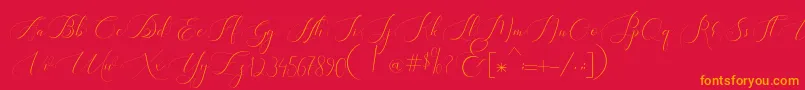 Fonte Heavenly Regular demo version – fontes laranjas em um fundo vermelho