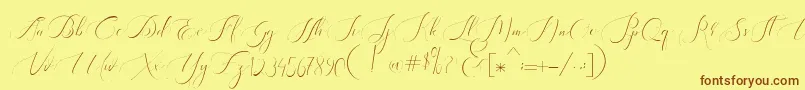 フォントHeavenly Regular demo version – 茶色の文字が黄色の背景にあります。