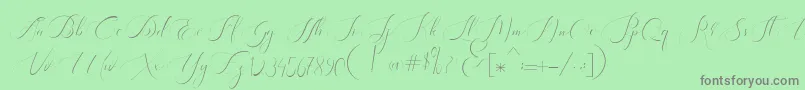 Heavenly Regular demo version-fontti – harmaat kirjasimet vihreällä taustalla