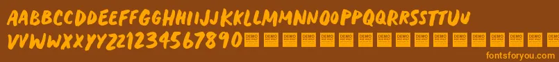 Heavy Trip   Demo Font – Orange Fonts on Brown Background