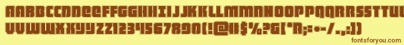 heavyfalconacad-Schriftart – Braune Schriften auf gelbem Hintergrund