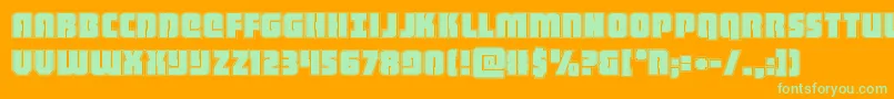 heavyfalconacad-Schriftart – Grüne Schriften auf orangefarbenem Hintergrund