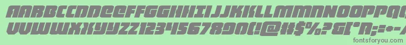 heavyfalconexpandital-Schriftart – Graue Schriften auf grünem Hintergrund