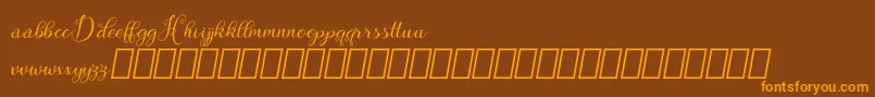 Hebydia Demo Font – Orange Fonts on Brown Background