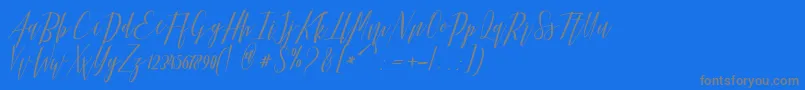 Hellarria-fontti – harmaat kirjasimet sinisellä taustalla