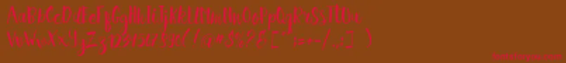 Hellena Script Free Sample Font – Red Fonts on Brown Background