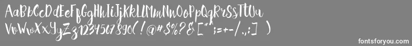 Hellena Script Free Sample-Schriftart – Weiße Schriften auf grauem Hintergrund