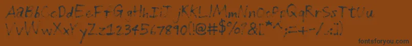 Шрифт GrungeHandwriting – чёрные шрифты на коричневом фоне