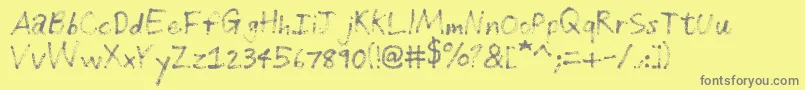 Saiba mais sobre a fonte GrungeHandwriting Fonte GrungeHandwriting – fontes cinzas em um fundo amarelo