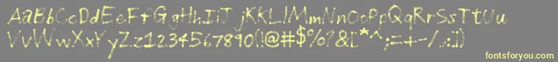 Czcionka GrungeHandwriting – żółte czcionki na szarym tle