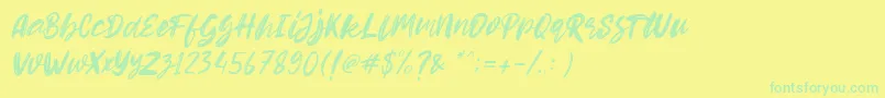 Fonte Hello Dear Demo Italic – fontes verdes em um fundo amarelo