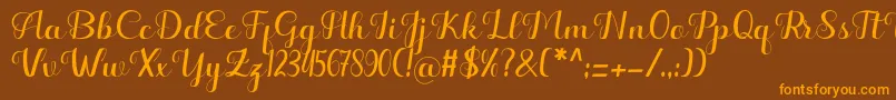 Hello Kayla Font – Orange Fonts on Brown Background