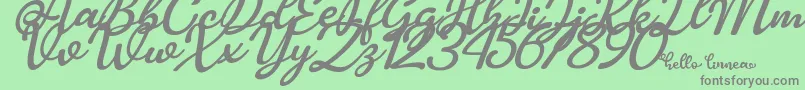 Fonte Hello Linnea italic – fontes cinzas em um fundo verde