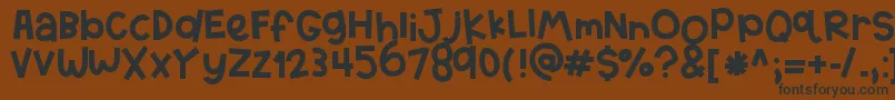 HelloTexas Font – Black Fonts on Brown Background