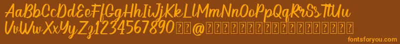 Hellow DEMO Font – Orange Fonts on Brown Background