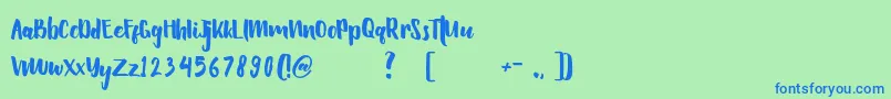 Hellowen Font – Blue Fonts on Green Background